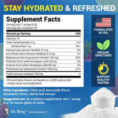 Dr. Berg hydration powder scoop beside the jar for quick mixing on the go.