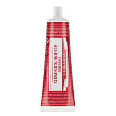 Dr. Bronner's All-One Cinnamon toothpaste tube closeup highlights natural whitening potential.