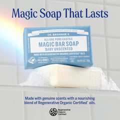 Dr. Bronner's Baby Unscented bar soap in use for body and face cleansing.