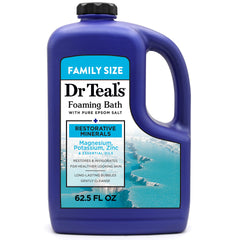 Dr Teal's foaming bath bottle being poured for a calming soak.