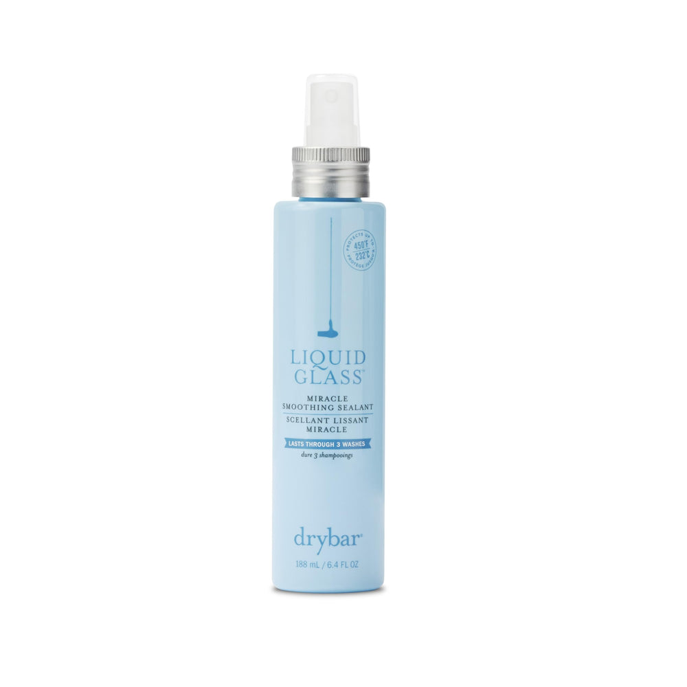 Drybar Liquid Glass bottle close-up, smoothing sealant for a glossy, frizz-resistant finish.