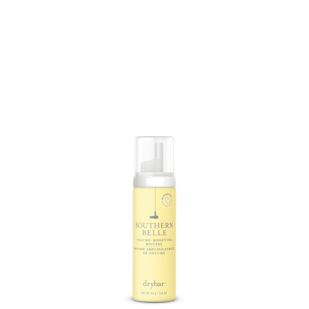 Drybar Southern Belle Volume-Boosting Mousse bottle ready for travel, adds body and shine.