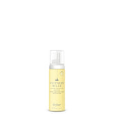 Drybar Southern Belle Volume-Boosting Mousse bottle ready for travel, adds body and shine.