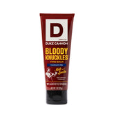 Duke Cannon Bloody Knuckles balm travel-size tube for on-the-go hand care.