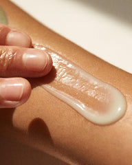 Dune Suncare Bod Guard being applied to arm for hydration and protection
