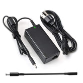 E ERSY 65W charger plugged into Dell Inspiron for reliable power on the go