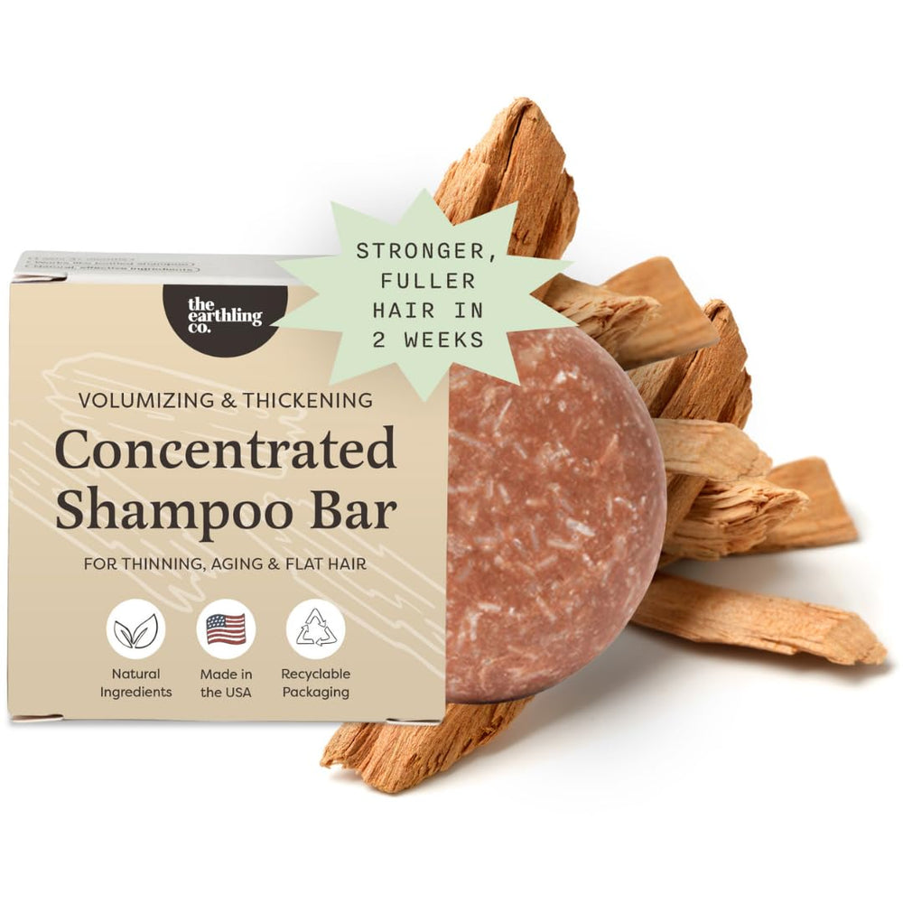The Earthling Co volumizing shampoo bar with sweet sandalwood lather demonstrates rich cleansing.