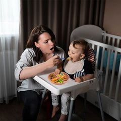 Eascrozn stay-put baby plates on a high chair tray support independent feeding.