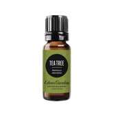 Edens Garden Tea Tree essential oil bottle for purifying aroma and skincare.