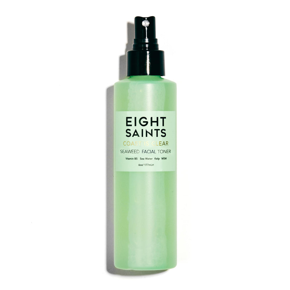 Eight Saints Coast is Clear bottle on bathroom counter for pore care.