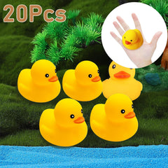 Ensbelei squeaky ducks close-up with red beaks in play