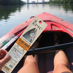 EPIC Smoked Maple Salmon Strip serving on board suggests on-the-go snack.