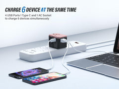 EPICKA travel adapter rose gold ports in use with multiple devices charging