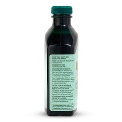 Essiac bottle close-up emphasizes heritage since 1922 and authentic herbal blend.