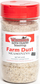 Farm Dust Seasoning bottle front showing all-purpose flavor enhancer in a modern kitchen.