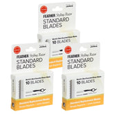 Feather Styling Razor blades in pack shot showing guarded precision for safe styling.