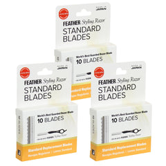 Feather Styling Razor blades in pack shot showing guarded precision for safe styling.
