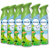 Febreze Air Mist Gain Original bottle releasing bright citrus aroma for living spaces.