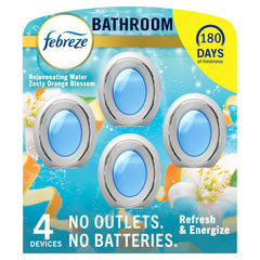 Febreze bathroom air freshener activation demonstrates long-lasting freshness in compact spaces.