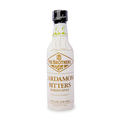 Fee Brothers Cardamom Bitters bottle pour enhances cocktail depth.