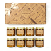 Feibao 8-pack candles in amber jars create cozy ambiance.