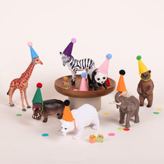 Fiestivo pom-pom detail adds playful sparkle to tiny hats