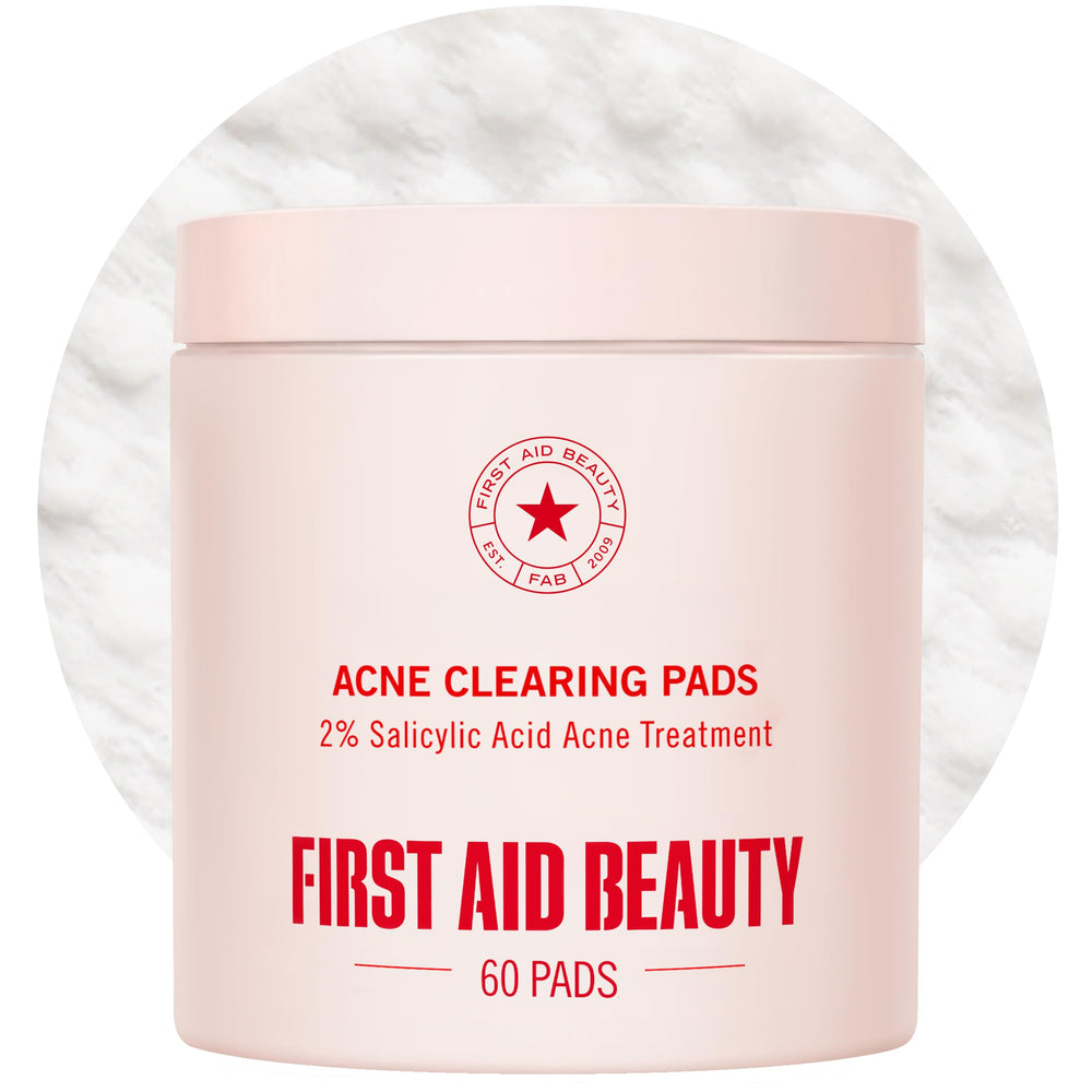 First Aid Beauty Acne Pads bottle pour for easy, on-the-go blemish control.