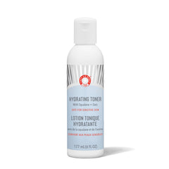 First Aid Beauty Hydrating Toner bottle pour illustrates alcohol-free hydration for sensitive skin.