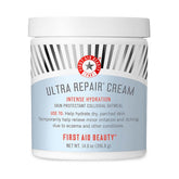 First Aid Beauty Ultra Repair Cream jar closeup, rich hydration for dry skin.