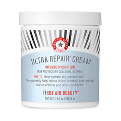 First Aid Beauty Ultra Repair Cream jar closeup, rich hydration for dry skin.