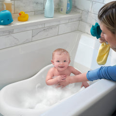 Fisher-Price Sit-Me-Up insert demonstrates extra stability for unsteady sitters