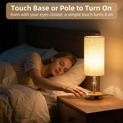 Warm wood finish of Fitfull lamp complements bedroom decor.