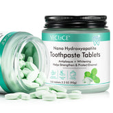 Flasture toothpaste tablets in a glass jar packaging for eco-friendly oral care on the go.