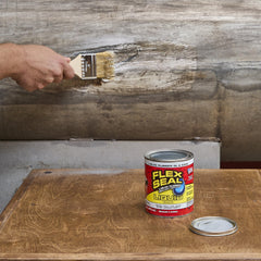 Flex Seal Liquid clear coating on a roof showing UV resistance and sealing