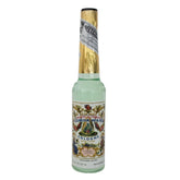 Florida Water bottle pour showcases a refreshing citrus aroma for energizing spaces.