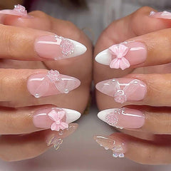 Foccna pink press-on nails with 3D flowers for a quick at-home manicure.