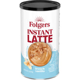 Folgers French Vanilla latte canister on kitchen counter for quick indulgence