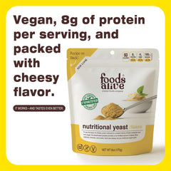Foods Alive Nutritional Yeast Flakes pouring into a pan for creamy vegan sauces.