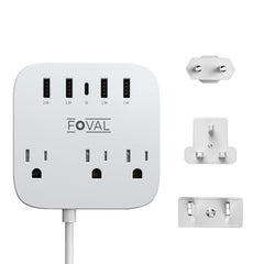 FOVAL travel adapter on a desk powering multiple devices at once.