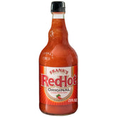 Frank's RedHot Original bottle pours over wings for bold flavor