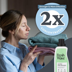 Measuring cap ready for Fresh Wave Laundry Booster in a wash