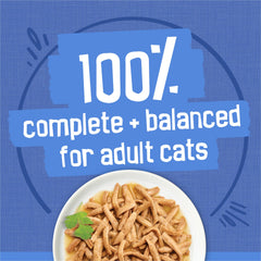 Friskies Shreds Ocean Whitefish and Tuna in Sauce close-up with flaky fish pieces and sauce.
