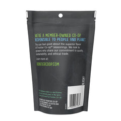 Frontier Co-op White Onion Powder pours from a bottle for easy seasoning