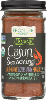 Frontier Co-op Cajun seasoning bottle on kitchen counter adds bold Louisiana flavor to meats