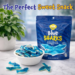 FUNTASTY Blue Sharks gummies used as a cake topper for an ocean-themed dessert.