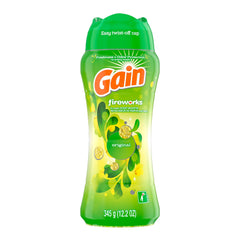 Gain Fireworks in-wash booster being poured into the drum for lasting freshness