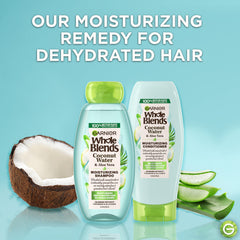 Close-up of Garnier Whole Blends coconut water and aloe vera shampoo label showing lightweight hydration