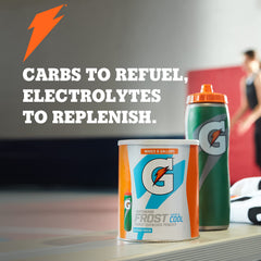 Gatorade G2 grape powder in a mixing cup ready for performance hydration.