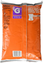 Gatorade Thirst Quencher Powder Purple Frost mixing glass for post-workout drink.