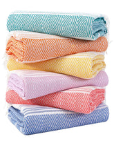 Genovega oversized towel showing full-body coverage for beach days.